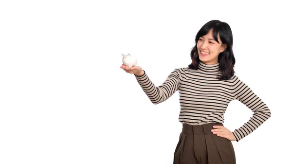 Portrait Young Asian Woman Holding White Piggy Bank Isolated White — Stok fotoğraf