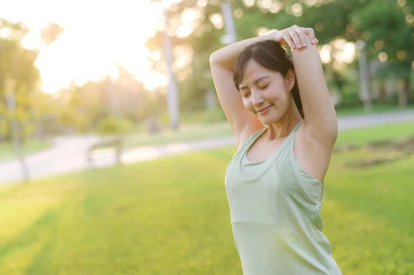 Female Jogger Fit Asian Young Woman Green Sportswear Stretching Muscle — Stock Photo, Image