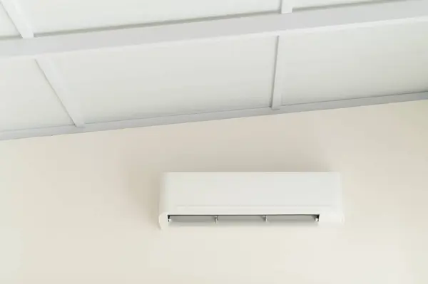 air conditioning system. pure indoor climate. With advanced technology and energy efficient operation, white wall mounted unit ensures optimal temperature and ventilation.