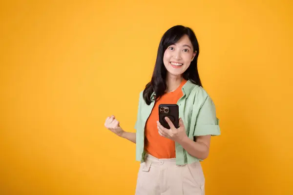 Excited Young Asian Woman 30S Dressed Orange Shirt Green Jumper — Stock Photo, Image