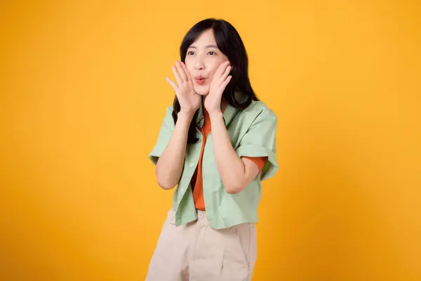 Energetic Asian Woman 30S Vibrant Green Orange Shirt Shouting Enthusiasm — Stock Photo, Image
