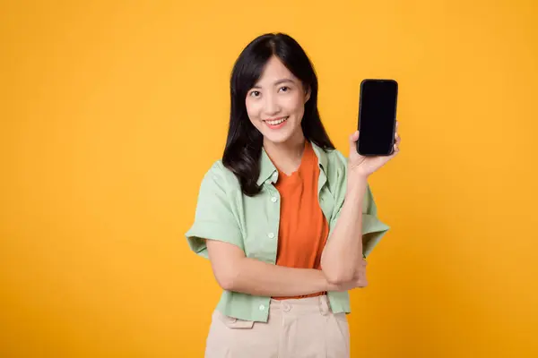 New Mobile Application Cheerful Young 30S Asian Woman Donning Orange — Stock Photo, Image