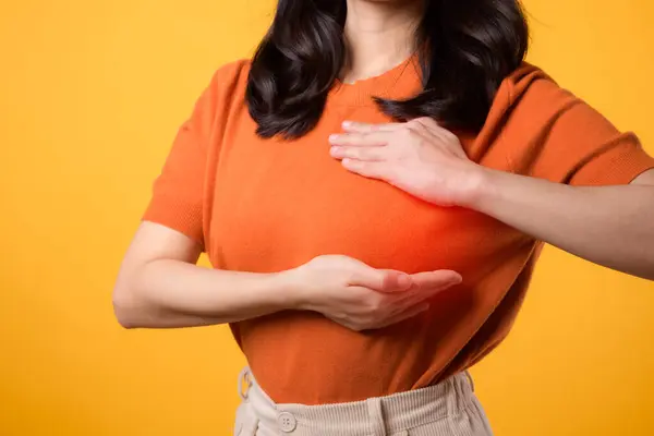 Woman Hands Checking Lumps Breast Signs Breast Cancer Yellow Background — Stock Photo, Image