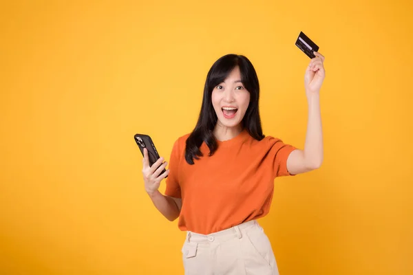 Content Young Asian Woman Her 30S Orange Shirt Using Smartphone — Stock Photo, Image