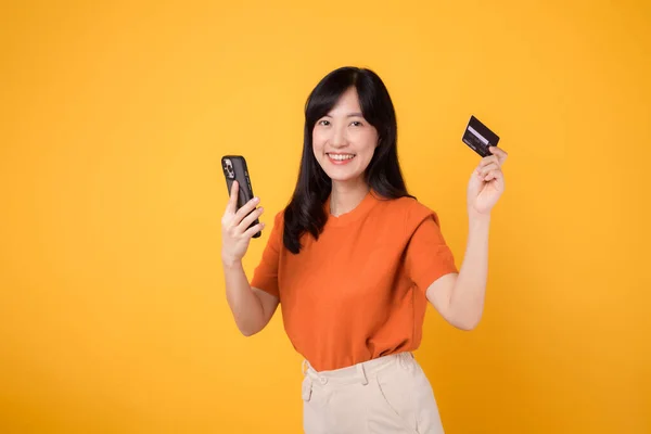 Energetic Young Asian Woman 30S Using Smartphone Holding Credit Card — Stock Photo, Image