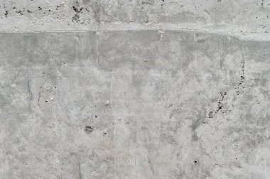 Ev tadilatı sırasında gri beton duvar dokusu. pürüzlü yüzey arka planı modern arkaplan için yapı ve yapı malzemelerinin detaylarını gösterir