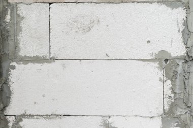 Ev tadilatı sırasında yeni beton duvar arka planının yakın dokusu. Bina inşaat projesi çiğ beton ve güçlü yapısal temeller gösteriyor