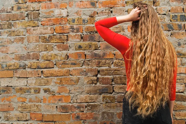 Woman Stands Her Back Camera Beautiful Long Curly Hair Blonde — Stock Photo, Image