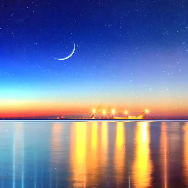 blue sea at  Night port on horizon  blurred light on horizon at sea blue water wave  starry sky and moon