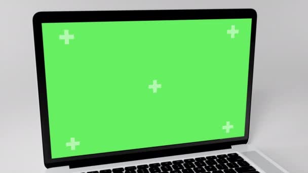 绿色屏幕显示笔记本电脑打开并在白色背景上放大 用于视频呼叫 网站模板演示或游戏应用程序的空绿色模型监视器 空白屏幕监视器3D渲染 — 图库视频影像