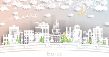 Boise Idaho. Kar taneleri, ay ve neon çelenklerle kağıt kesiği şeklinde ufuk çizgisi. Noel ve yeni yıl konsepti. Noel Baba kızakta. Boise ABD şehir simgeleriyle.