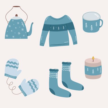Mavi renkte Noel seti. Süveter, mum, çorap, bardak, su ısıtıcı ve eldiven.