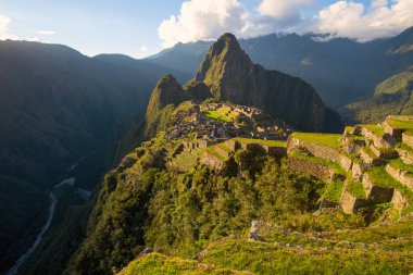 Machu Picchu 'da gün batımı, kayıp şehir İnka - Peru.