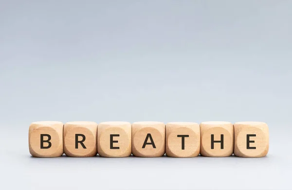 Breathe Word Wooden Blocks Gray Background Copy Space — Stock Photo, Image