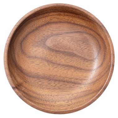 Empty round wooden plate or bowl isolated on white background. Walnut wood. Top view