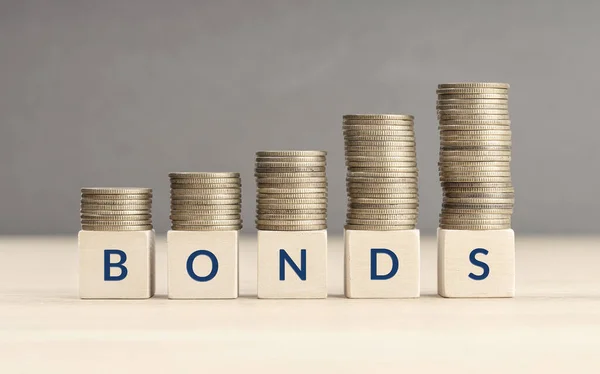Bonds Increasing Concept Text Word Wooden Blocks Coins Stacked Increasing — Stock Photo, Image