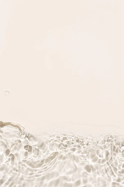 Banner of beige Abstract water background texture with ripples and waves. Copy space