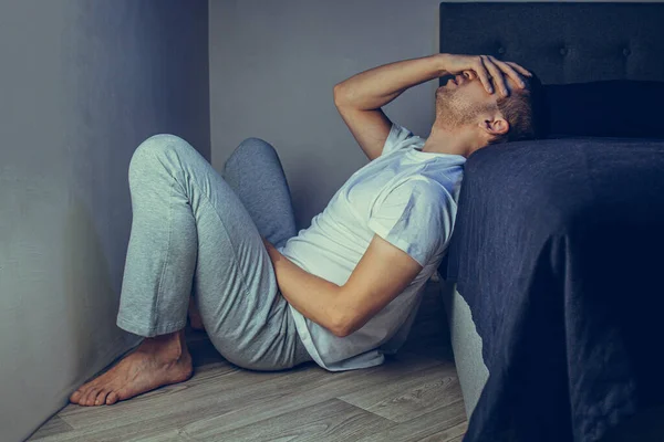 Depressed Man Sitting Floor His Head Leaning Wall Frustrated Feelings Stock Picture