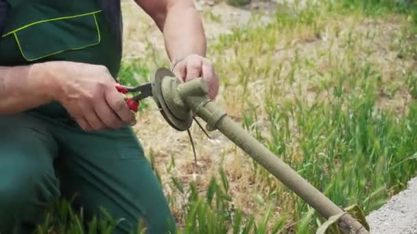 Close Mans Hand Taking Apart Lawn Mower Replace Parts Maintains — Vídeo de Stock