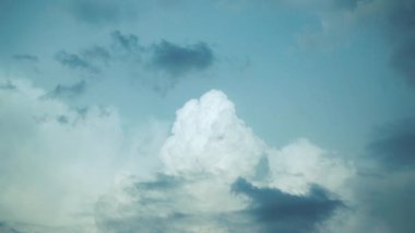 Timelapse of beautiful lush clouds. Nuclear explosion. A cloud in the form of a mushroom. An amazing natural formation of large cumulus clouds that appear to be moving like an explosion in the sky