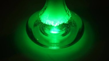 hookah. water gurgles in a hookah vessel. close-up. Bubbling water in hookah. Hookah bowl with boiling water