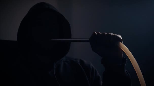 Young Man Hood Face Smokes Traditional Hookah Dark Room Concept — Vídeo de stock