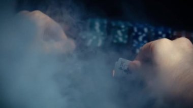 The player watches art while playing poker. A combination of four aces, four of a kind, winning cards fell out. Slow motion