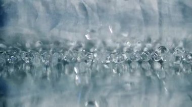White bokeh particle glitter awards dust gradient abstract background. Futuristic glitter in space on a blue background