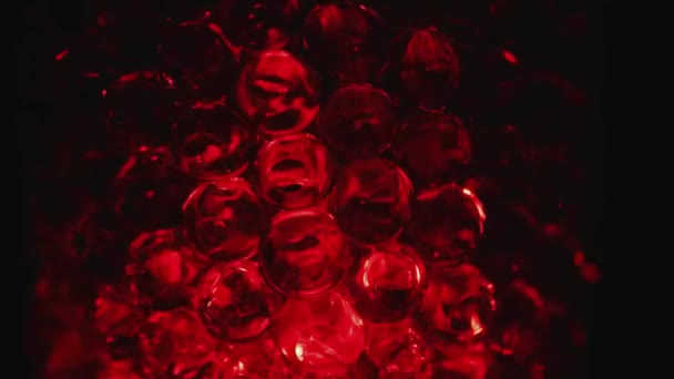 Water Colored Red Gel Balls Super Macro Bubbles Slow Motion — Video Stock