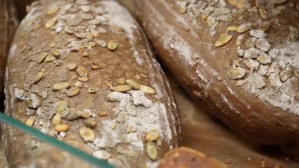 Loaves Rye Farm Bread Lie Wooden Bakery Shelf Close Shot — Stock Video
