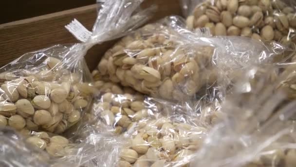 Arachis Packaged Plastic Grocery Store Packaging Different Types Nuts Window — Stock Video
