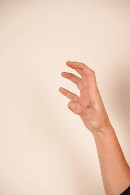 With fingers curved and spaced out, the hand replicates a cat's paw in motion. The pose exudes energy, playfulness, and a touch of fierceness. A unique gesture for emotional or animal-inspired ideas clipart