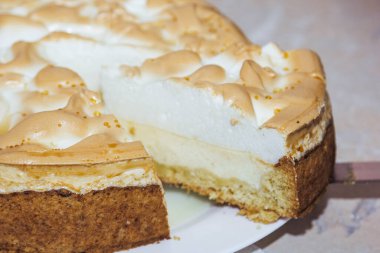 An inverted caramelized pie with a buttery pastry, baked to golden perfection and served warm