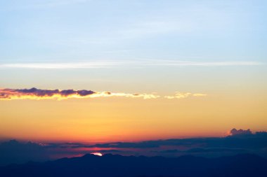 Natural Sunset Sunrise. Bright Dramatic Sky And Dark Ground. Countryside Landscape Under Scenic Colorful Sky
