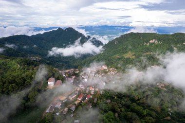 mountain ridge and clouds in rural jungle bush forest. Ban Phahee, Chiang Rai Province, Thailand