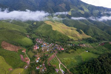 Top view Landscape of Morning Mist with Mountain Layer at north of Thailand. mountain ridge and clouds in rural jungle bush forest