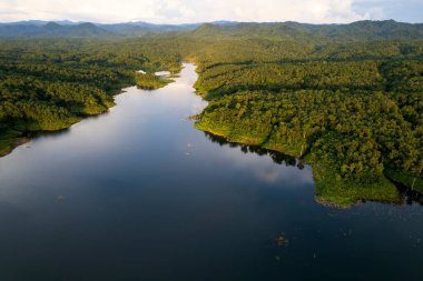 beautiful lake above the dam among blue sky clouds and mountains,lake mountain view