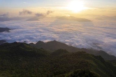 Top view Landscape of Morning Mist with Mountain Layer at north of Thailand. mountain ridge and clouds in rural jungle bush forest