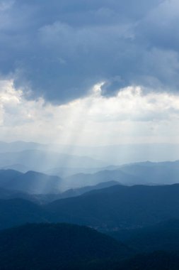 Top view Landscape of Morning Mist with Mountain Layer at north of Thailand. mountain ridge and clouds in rural jungle bush forest