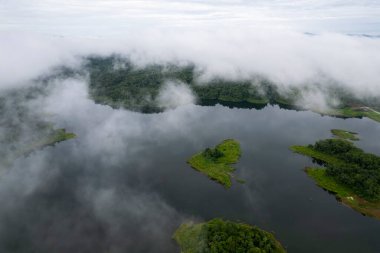 Landscape of Morning Mist with Mountain Layer at north of Thailand. mountain ridge and clouds in rural jungle bush forest