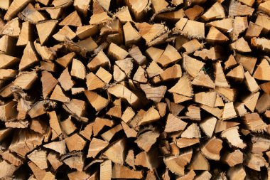 Luang Prabang, Laos 'ta odunların kesilip odun yığınlarının dokulu arkaplanı.