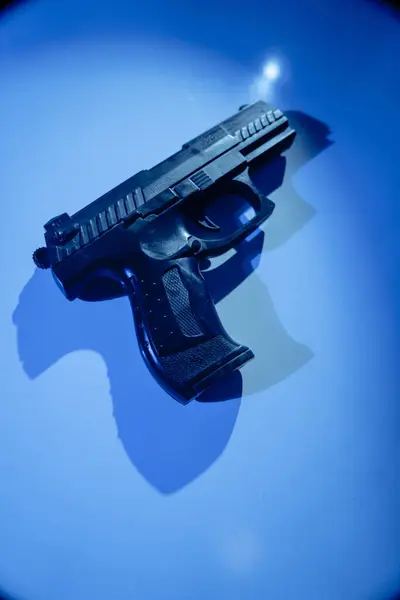 Pistol gun artistic photograph book cover design.