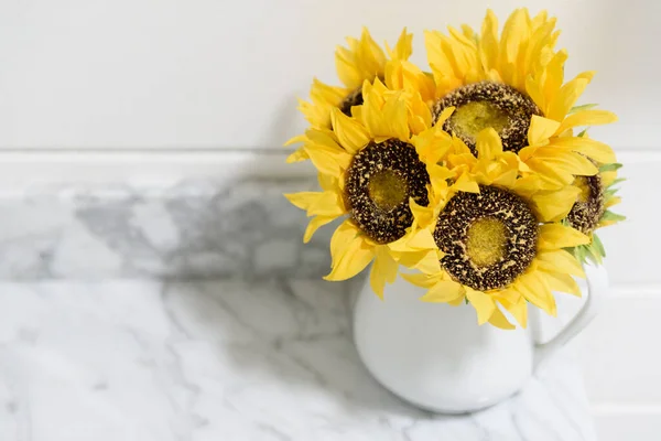 Stock image sunflowers in vase on marble