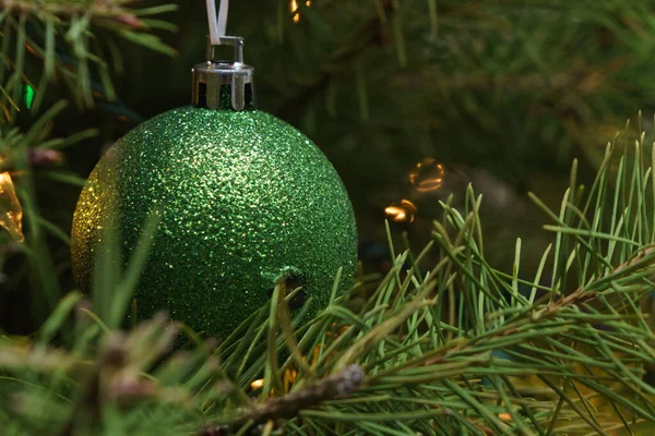 Green glitter christmas tree ornament ball