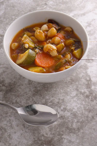 stock image A bowl of chunky minestrone soup