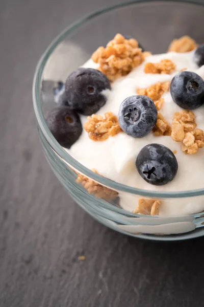 stock image Bowl of granola yogurt blueberries