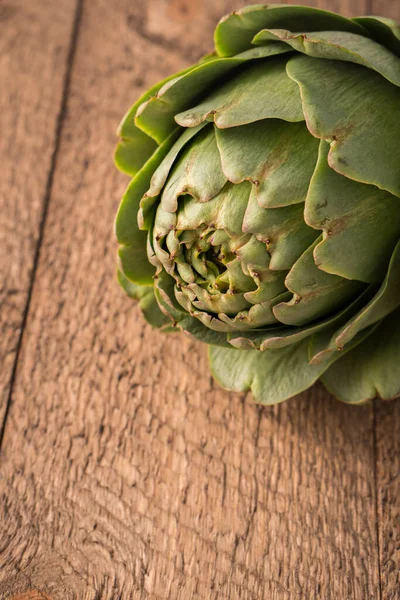 stock image An artichoke rustic raw