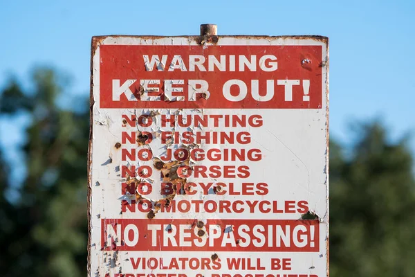 keep out no trespassing, hunting fishing jogging horses bicycles motorcycles sign