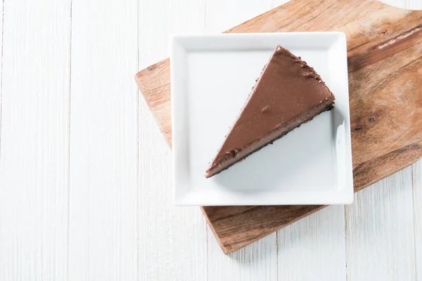 stock image A slice of pure chocolate cheesecake  