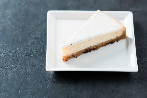 stock image A slice of classic cheesecake 